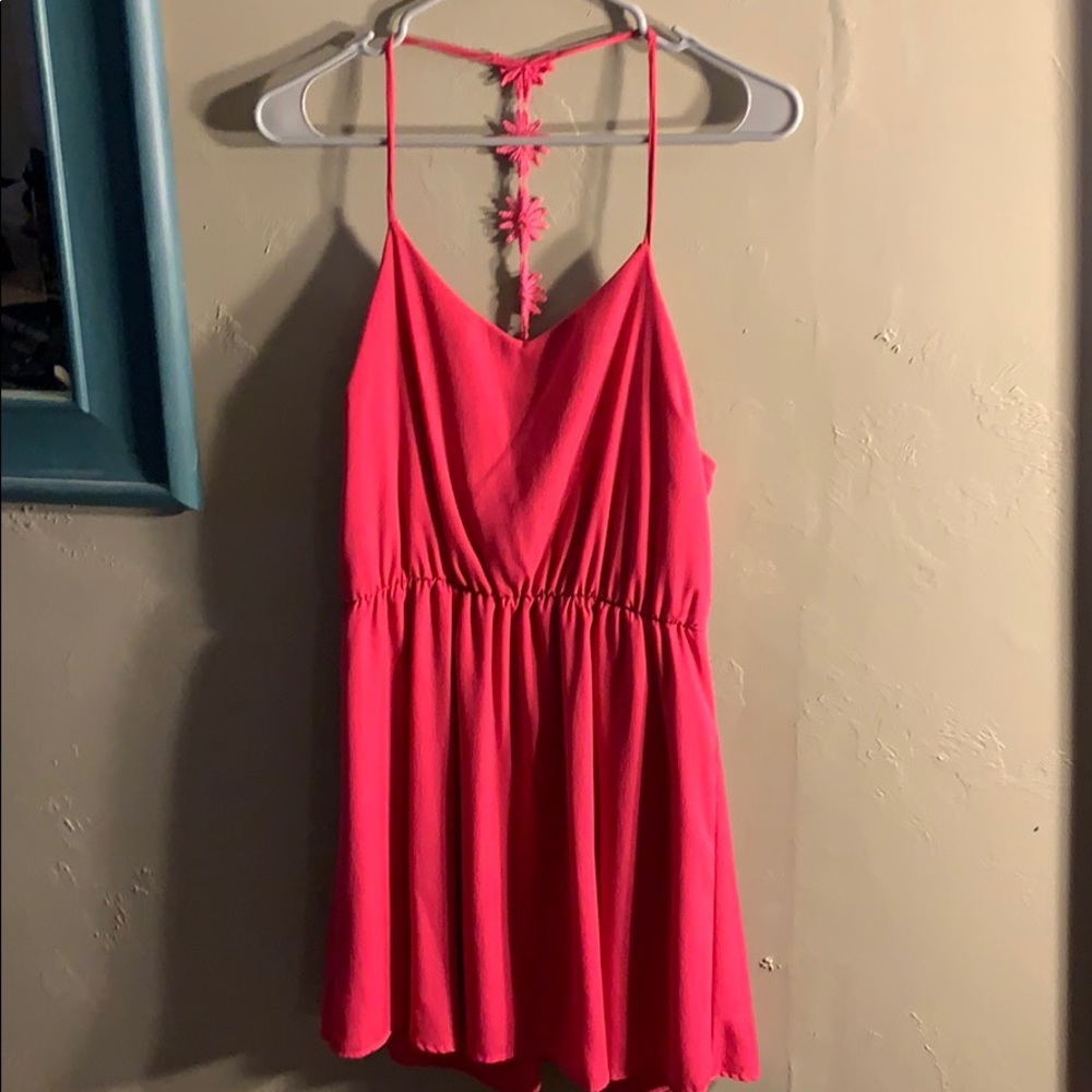 Hot pink dress with flower accents in back